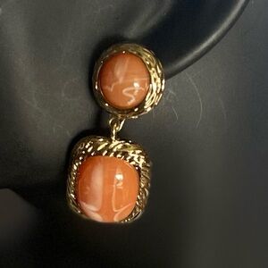 Express swirled resin double stone drop earrings